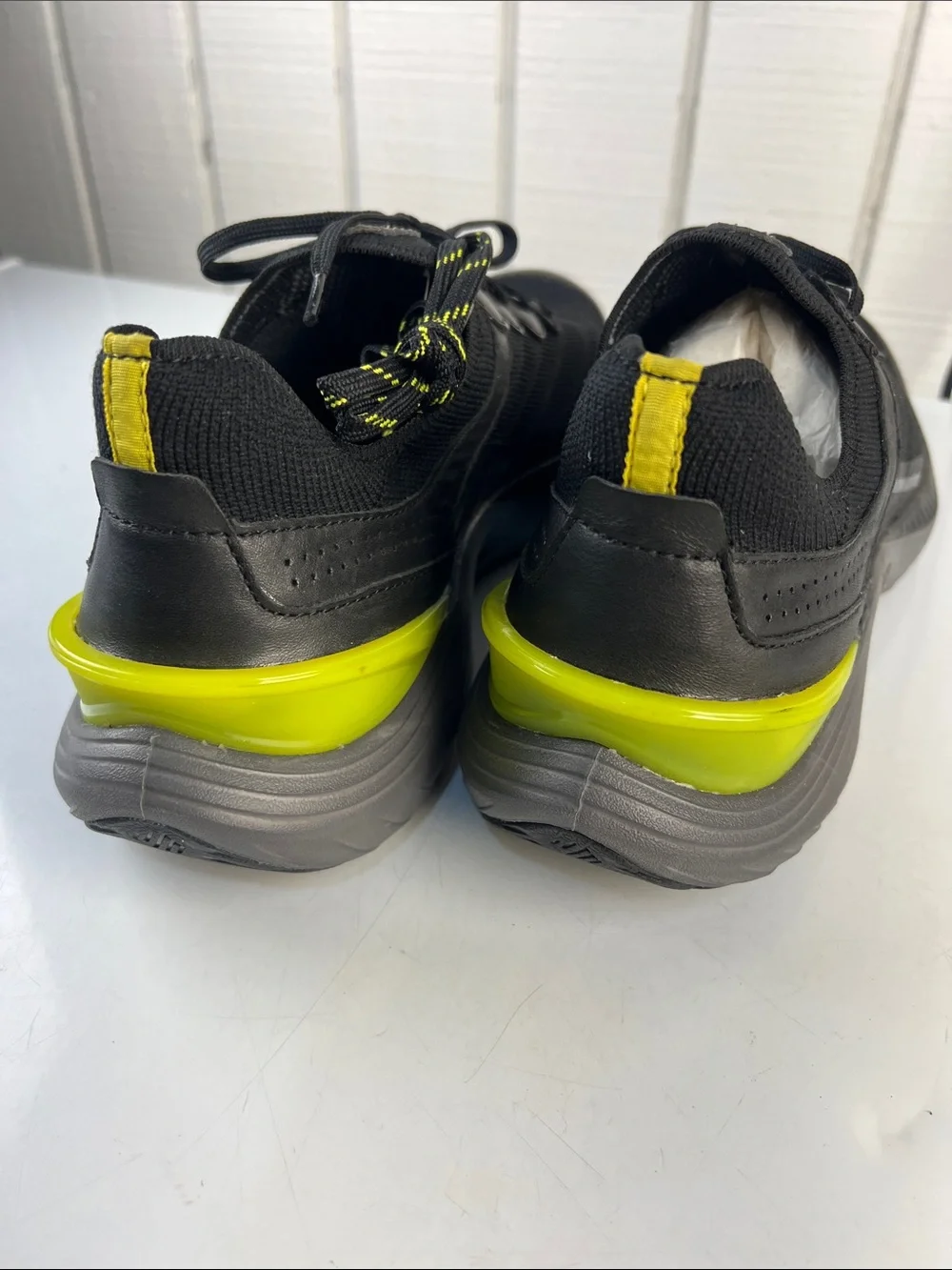 Johnston & Murphy Black Sneakers with Yellow Heel Accent